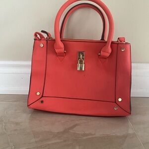 Chic Coral Satchel with Gold Details